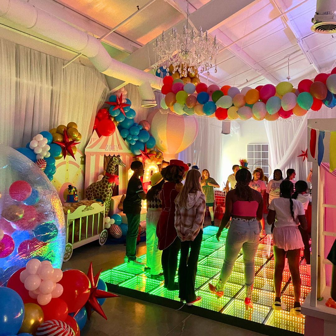 Colorful milestone celebration with dancing